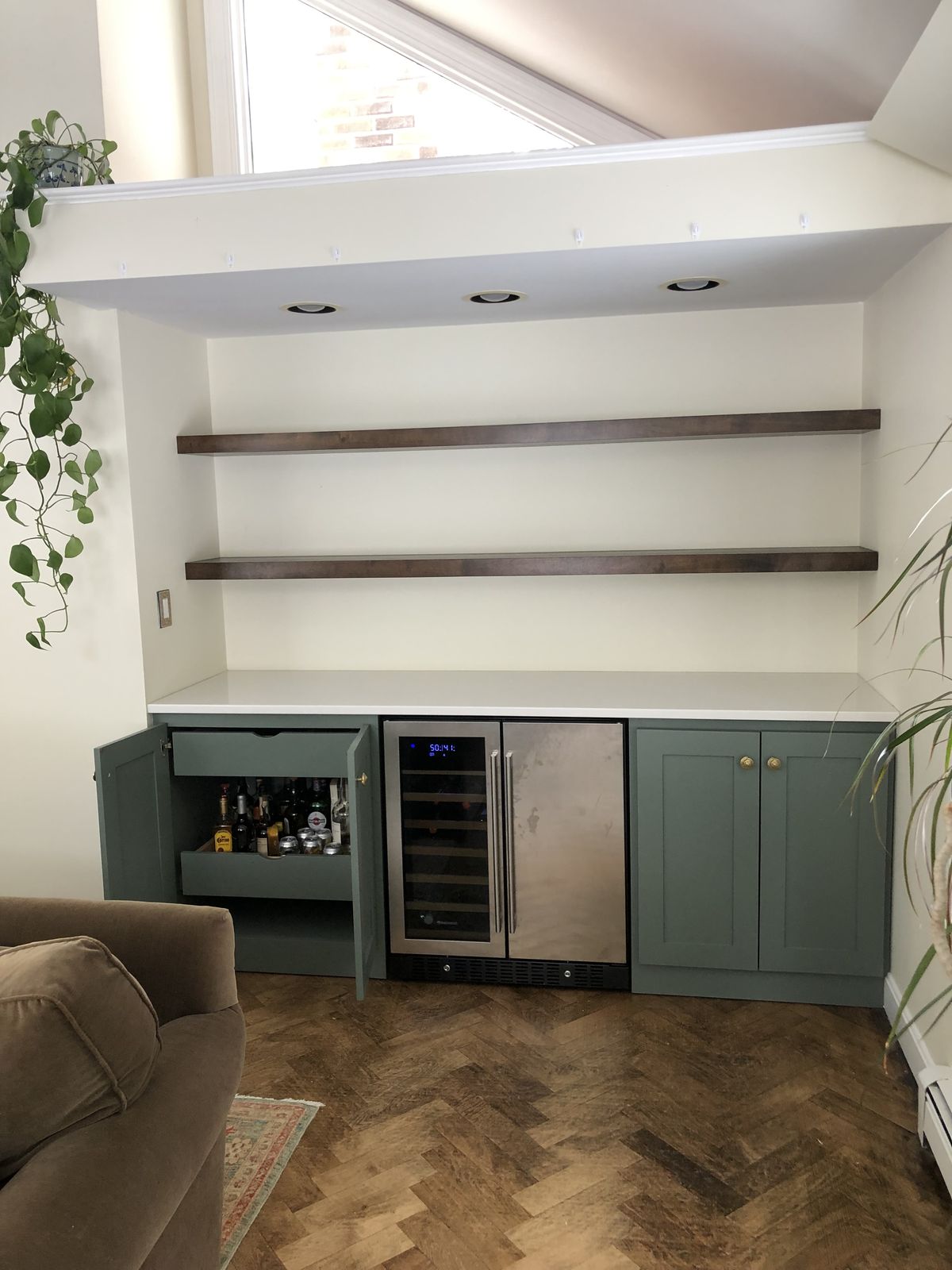 Floating shelves over beverage center