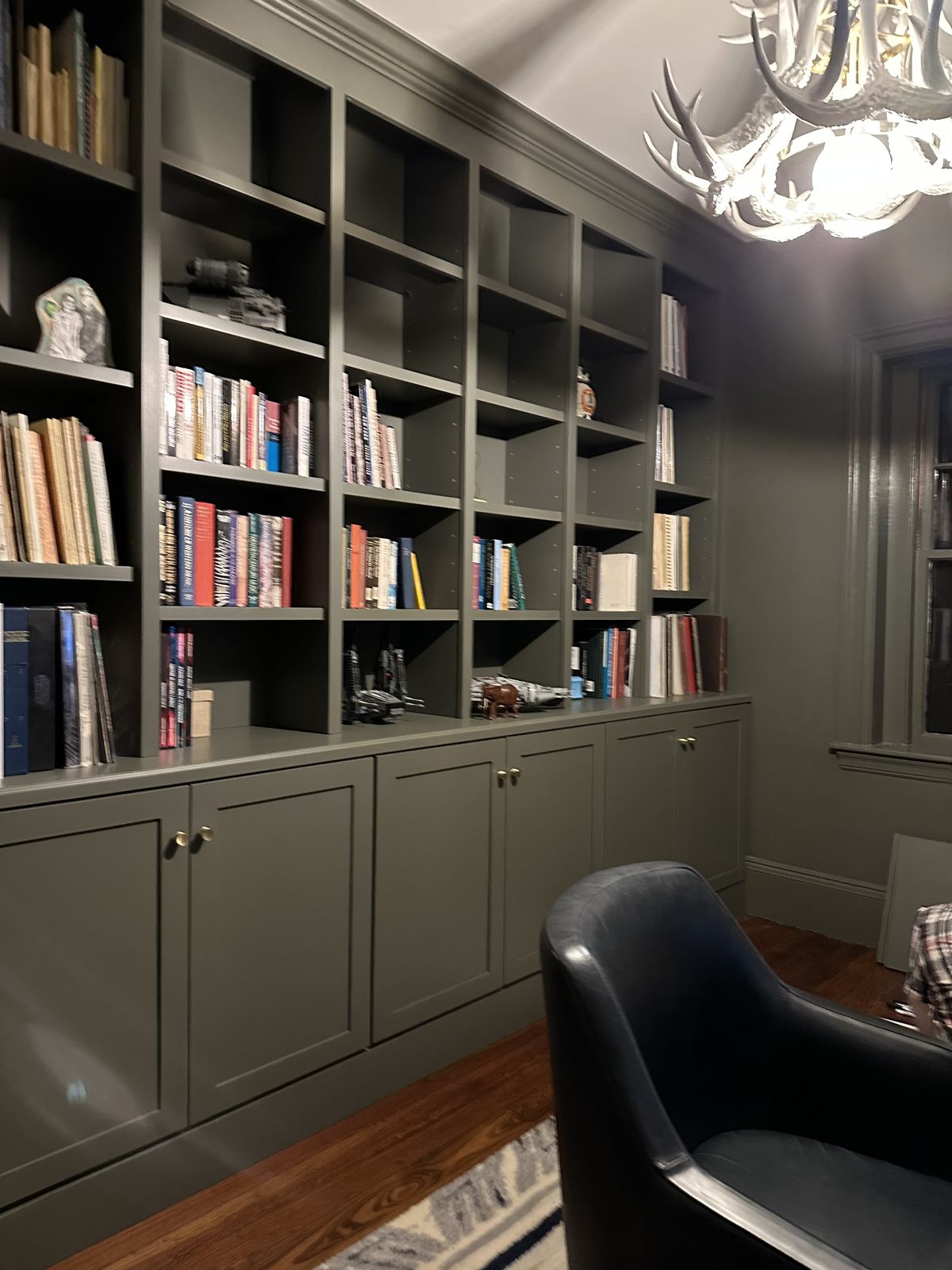 Grey library wall with open cubbies