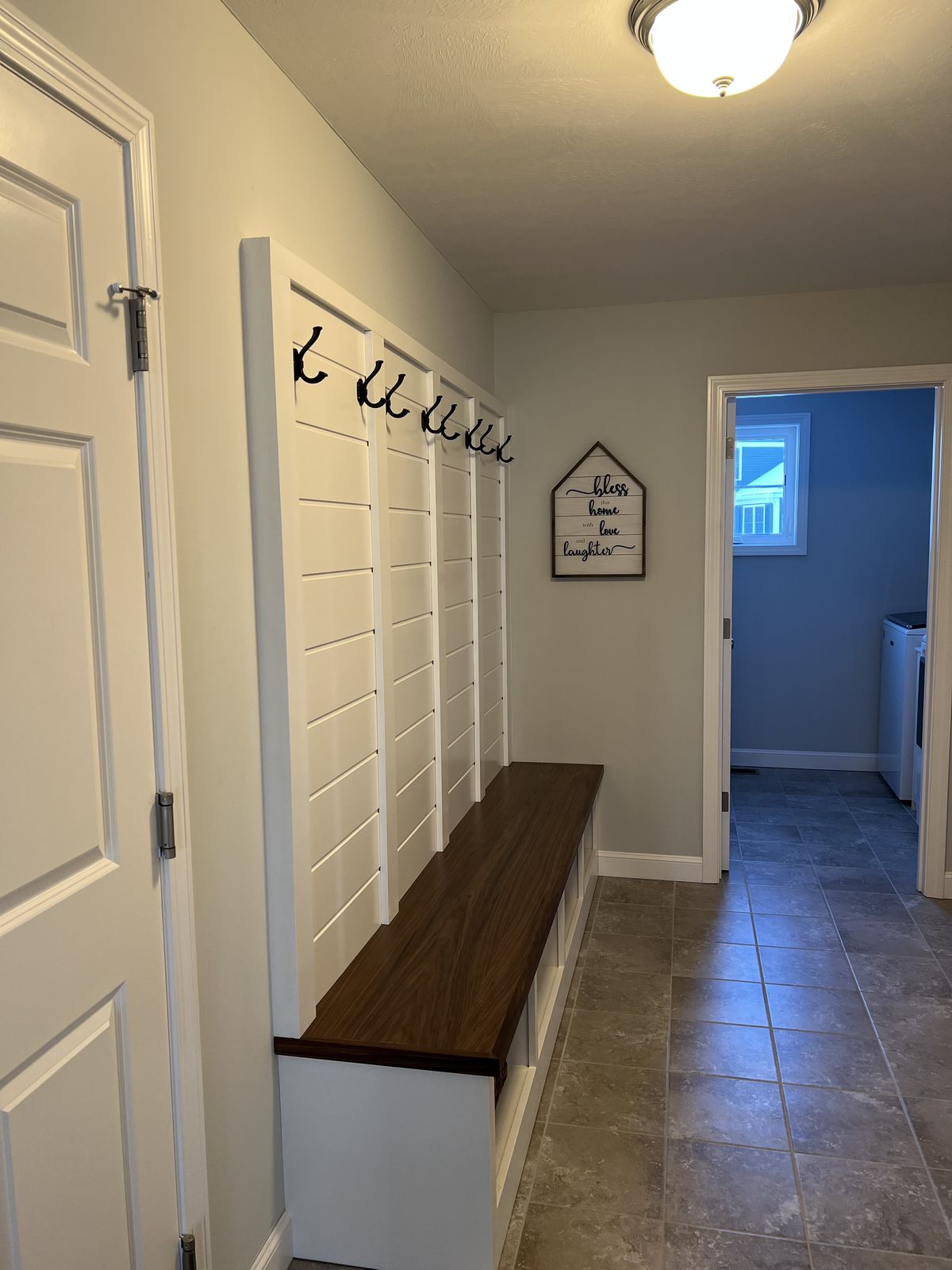 Mudroom bench with coat hooks