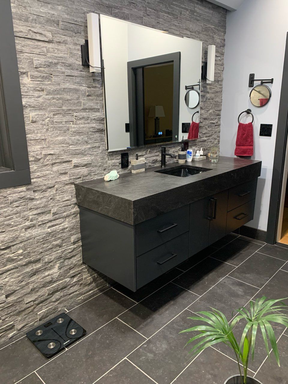 Vanity against stacked-stone wall